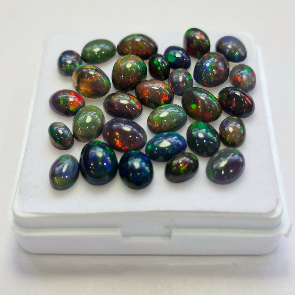 29 pcs of  Ethiopian Black Smoked Opal Oval Shape | 22.4Cts | 6mm to 9mm size