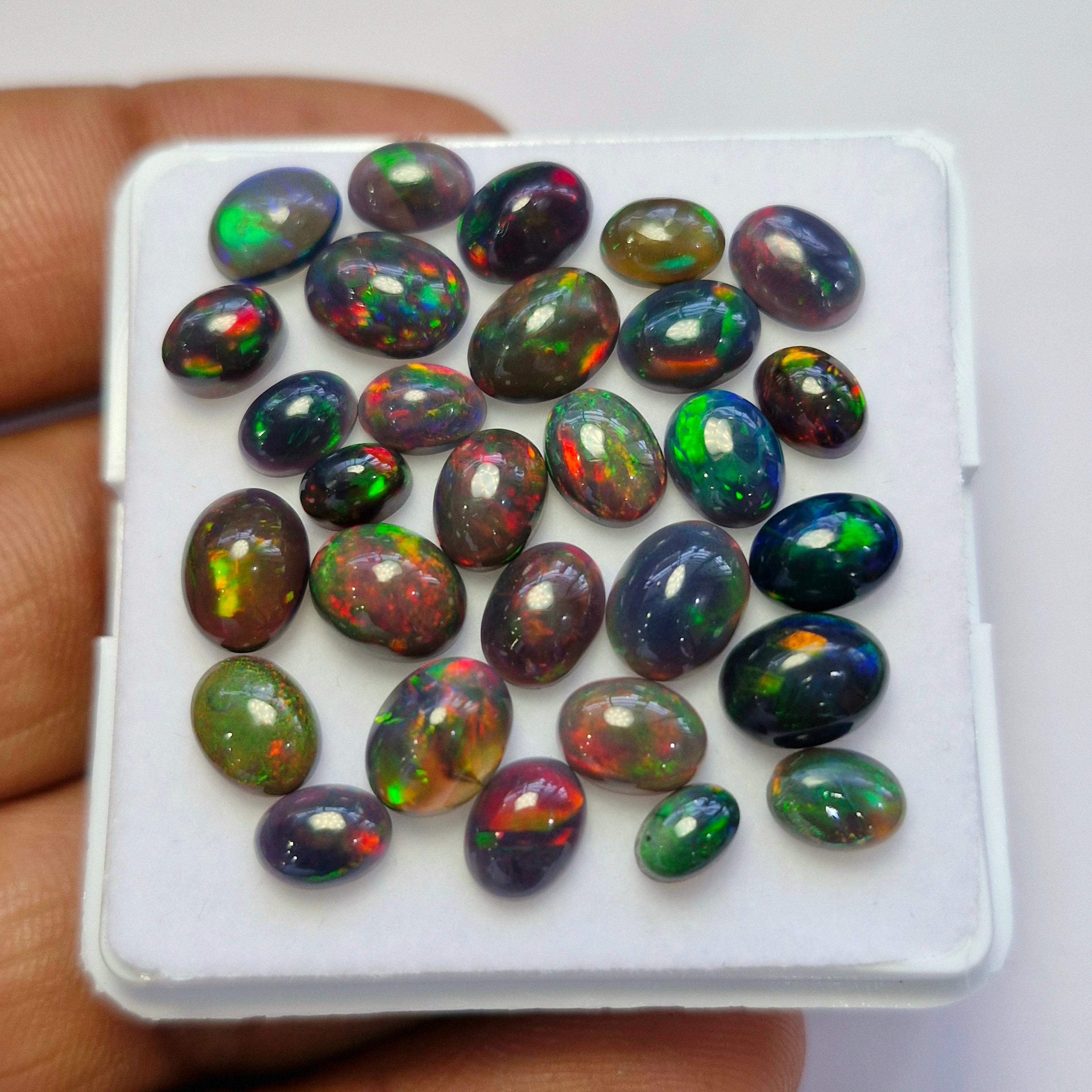 29 pcs of  Ethiopian Black Smoked Opal Oval Shape | 22.4Cts | 6mm to 9mm size