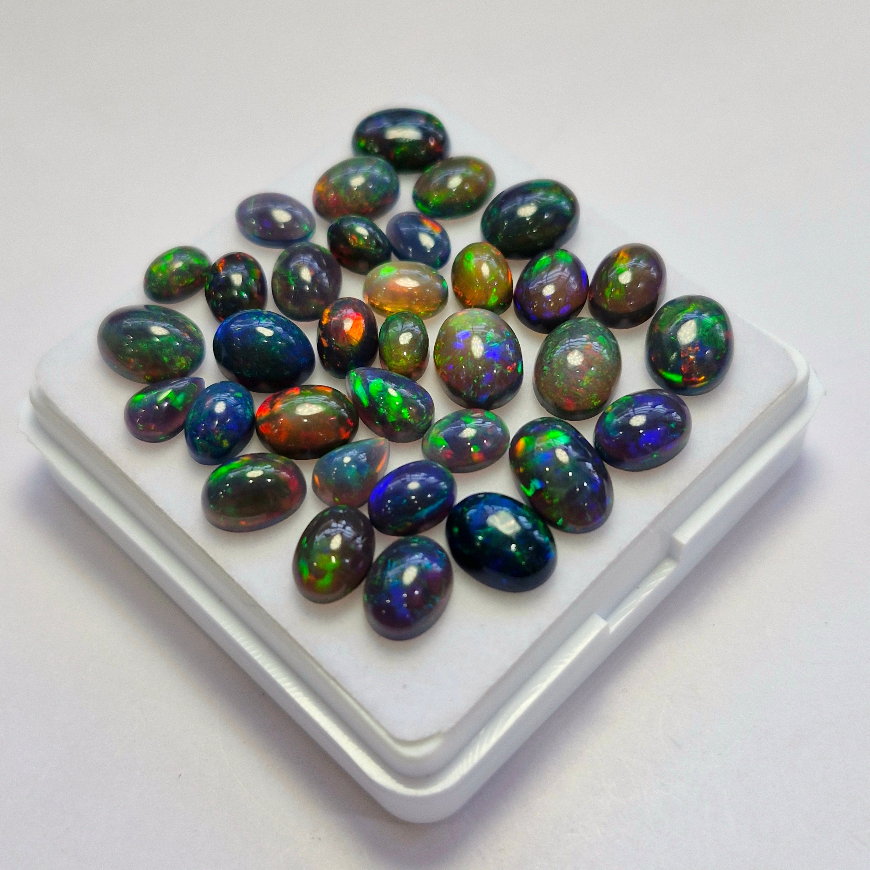33 pcs of  Ethiopian Black Smoked Opal Mix Shape | 25.7Cts | 6mm to 10mm size
