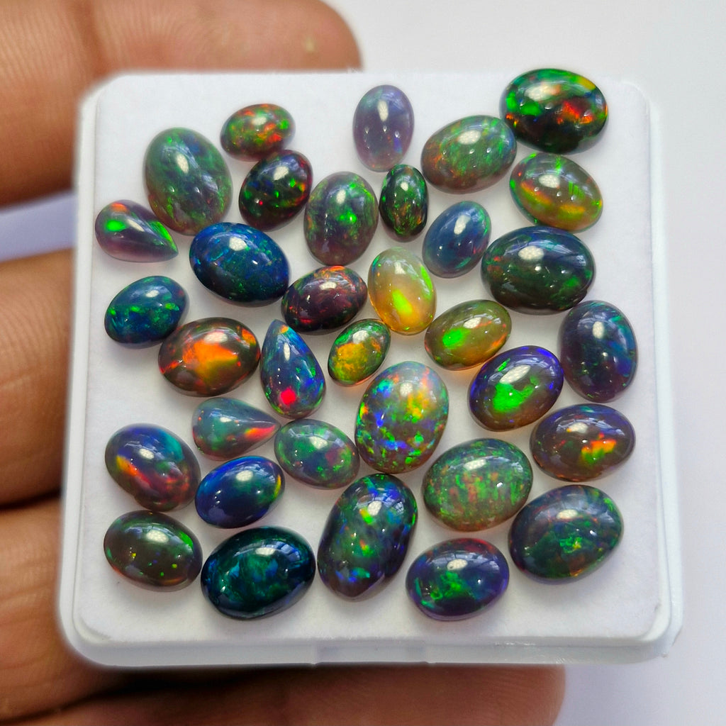 33 pcs of  Ethiopian Black Smoked Opal Mix Shape | 25.7Cts | 6mm to 10mm size