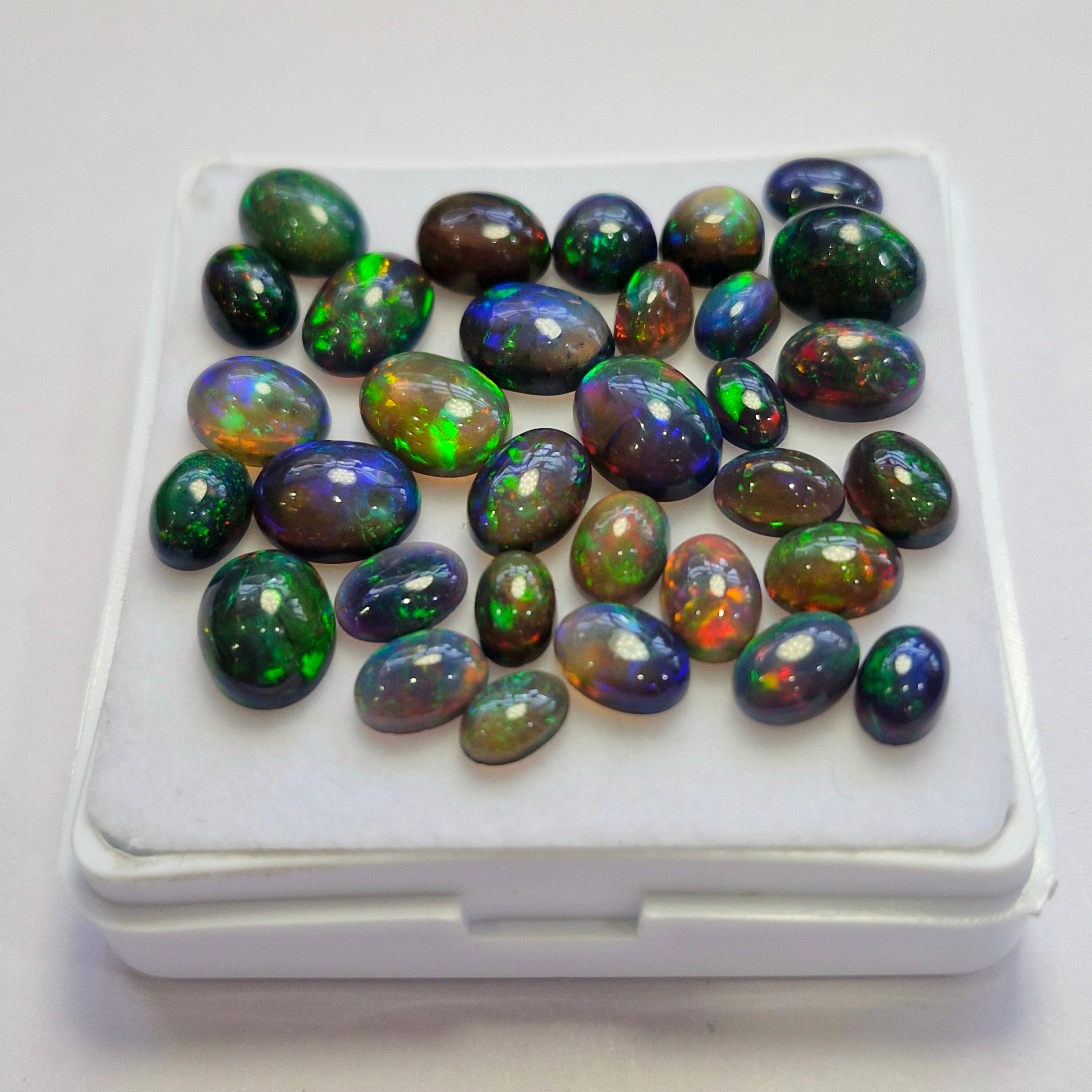 32 pcs of  Ethiopian Black Smoked Opal Mix Shape | 23.5Cts | 6mm to 9mm size