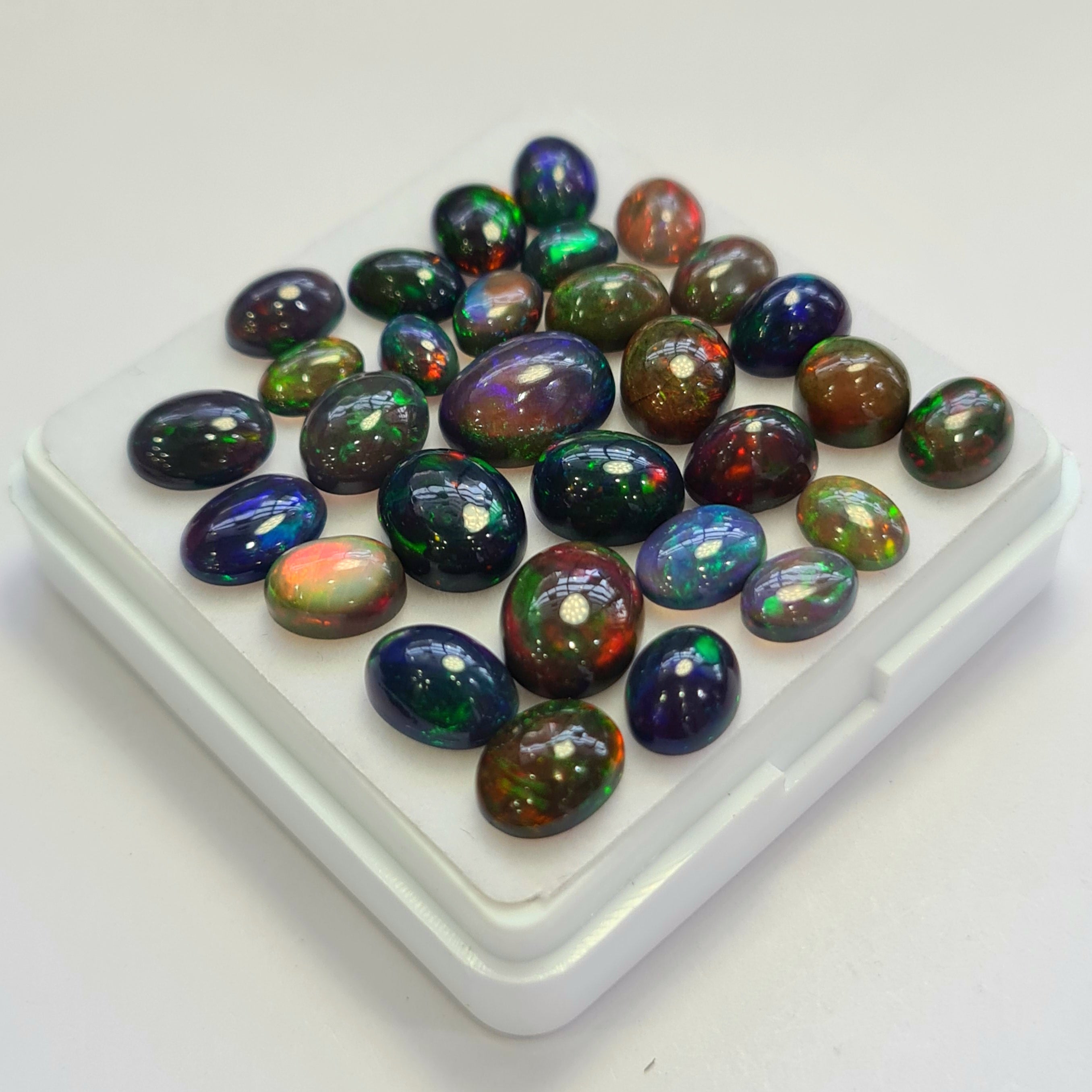 30 pcs of  Ethiopian Black Smoked Opal Oval Shape | 28Cts | 6mm to 11mm size