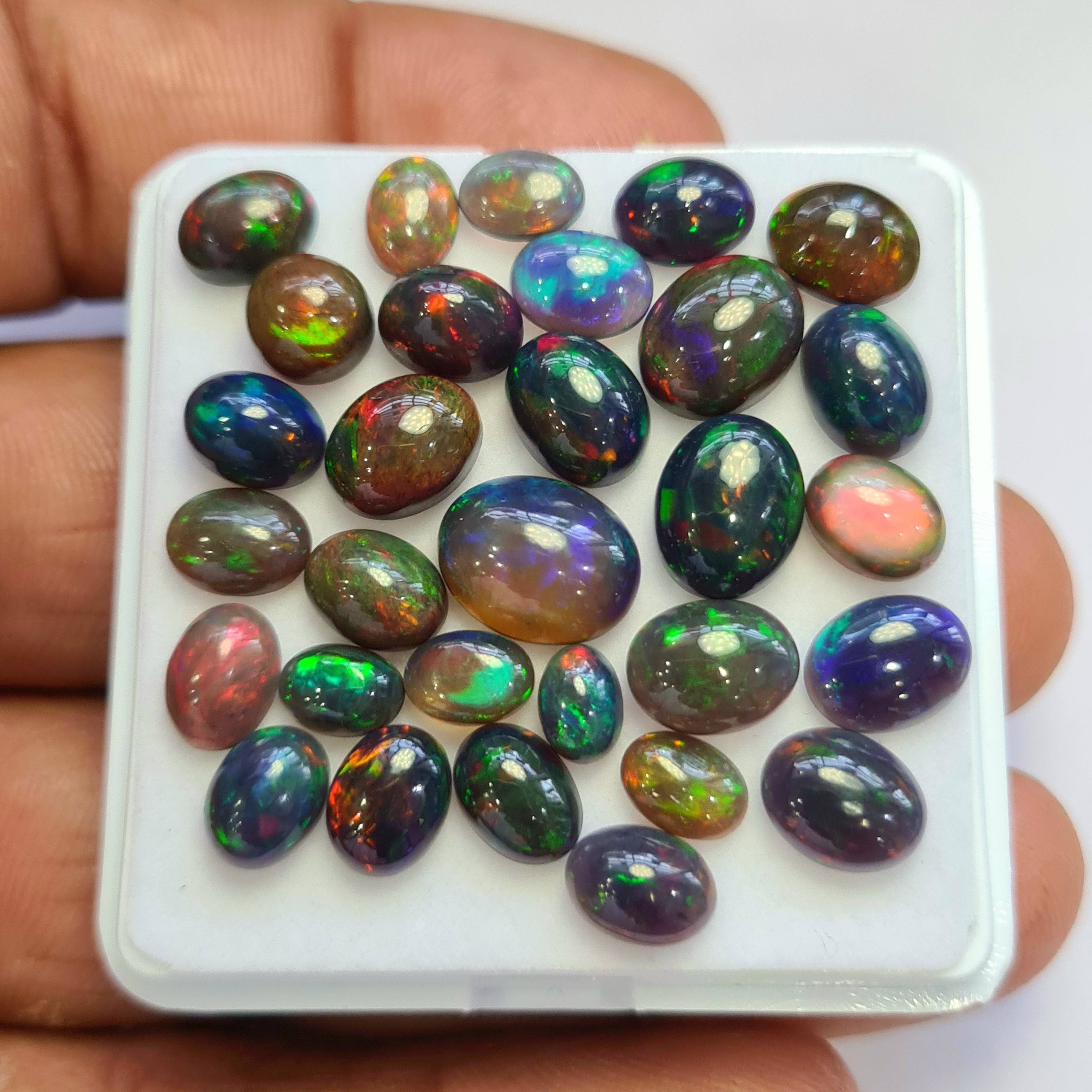 30 pcs of  Ethiopian Black Smoked Opal Oval Shape | 28Cts | 6mm to 11mm size