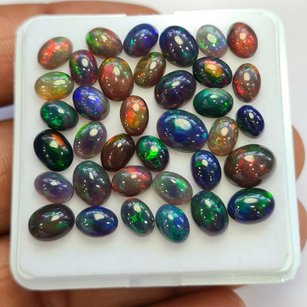 36 pcs of  Ethiopian Black Smoked Opal Oval Shape | 23.1Cts | 6mm to 9mm size