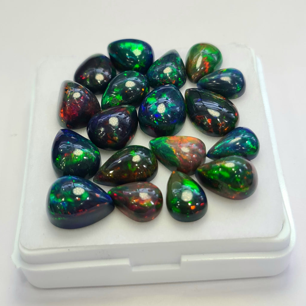18 pcs of  Ethiopian Black Smoked Opal Pear Shape | 36.5Cts | 10mm to 13mm size