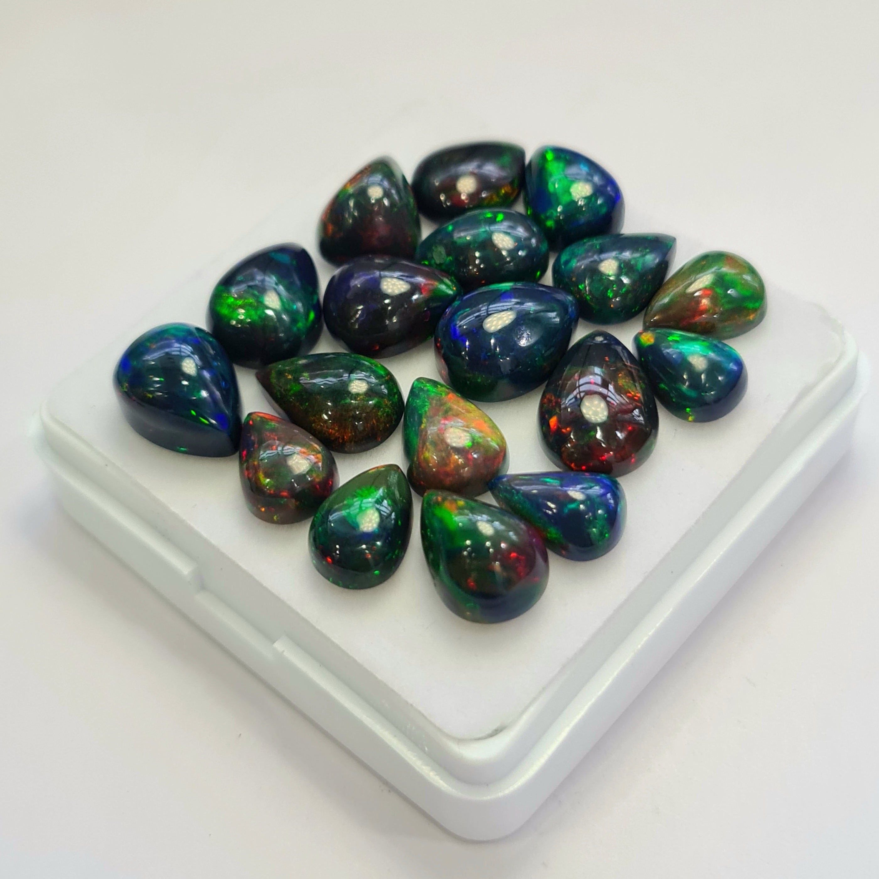 18 pcs of  Ethiopian Black Smoked Opal Pear Shape | 36.5Cts | 10mm to 13mm size