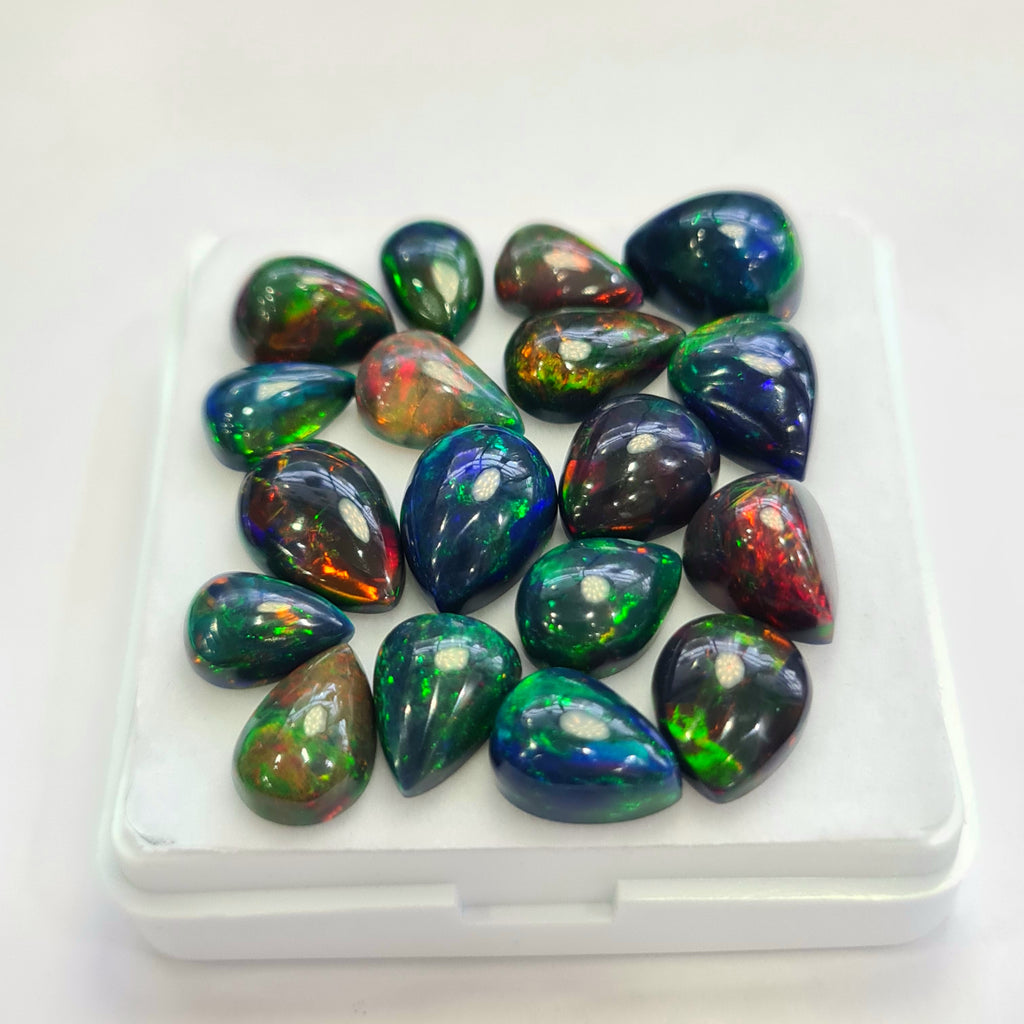 18 pcs of  Ethiopian Black Smoked Opal Pear Shape | 36.5Cts | 10mm to 13mm size