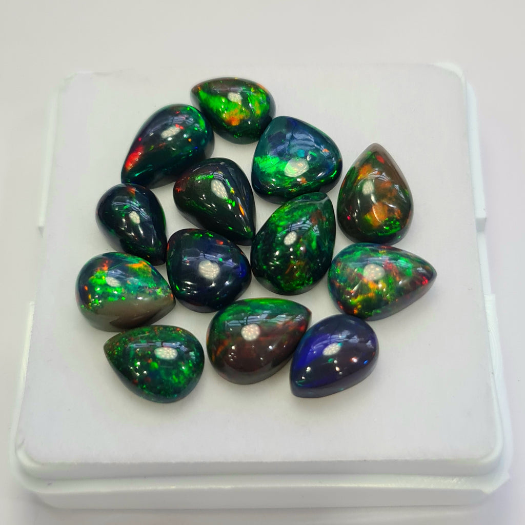 13 pcs of  Ethiopian Black Smoked Opal Pear Shape | 24.1Cts | 10mm to 12mm size