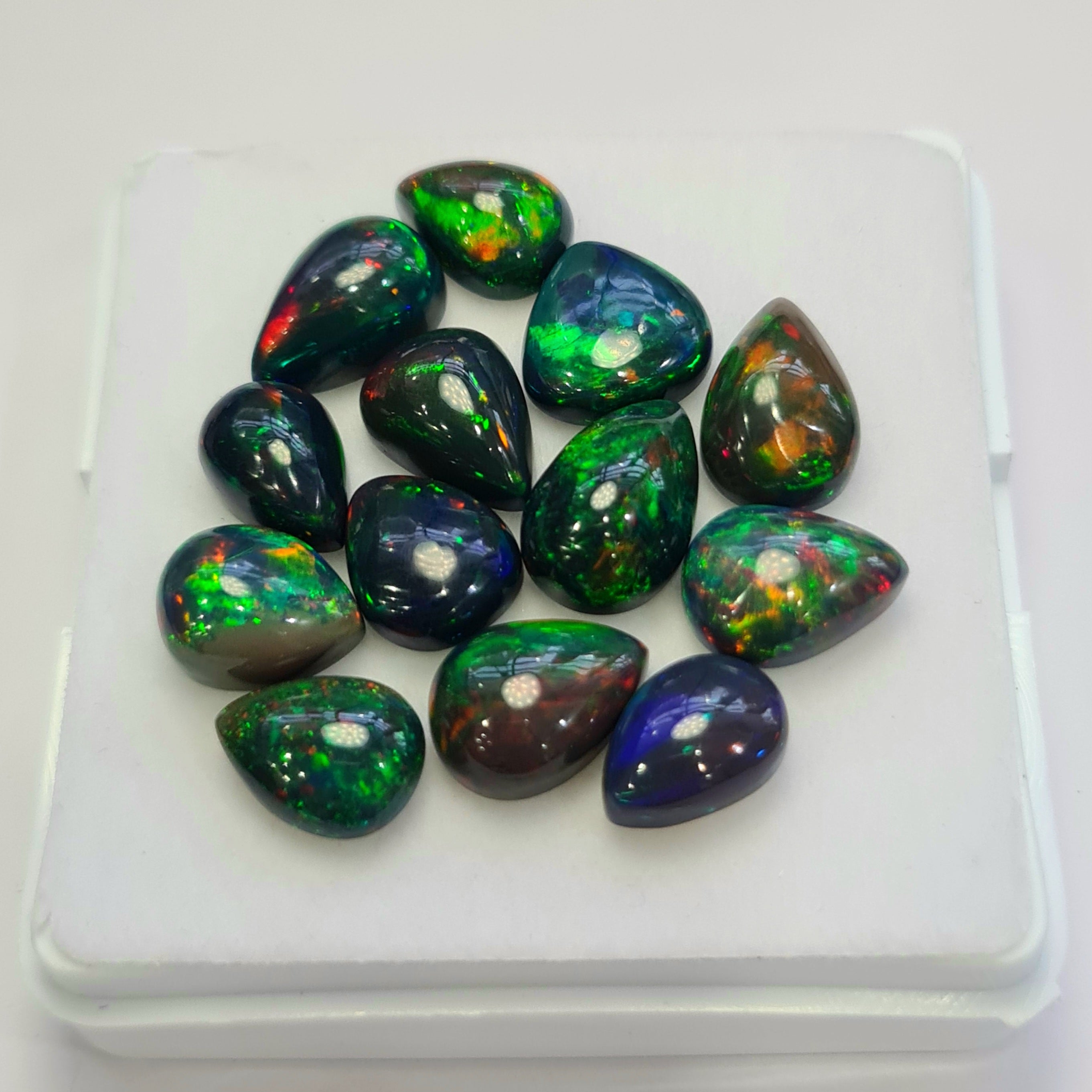 13 pcs of  Ethiopian Black Smoked Opal Pear Shape | 24.1Cts | 10mm to 12mm size