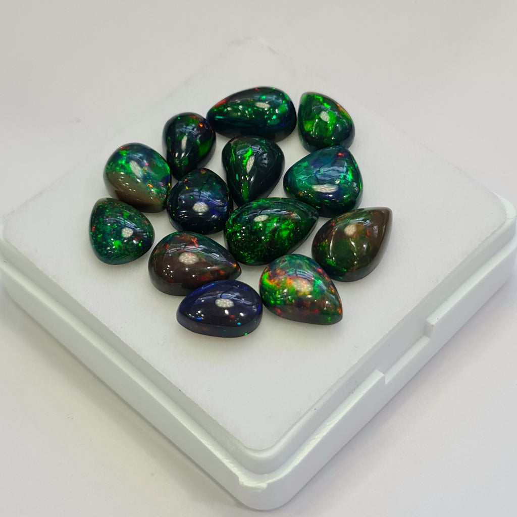 13 pcs of  Ethiopian Black Smoked Opal Pear Shape | 24.1Cts | 10mm to 12mm size