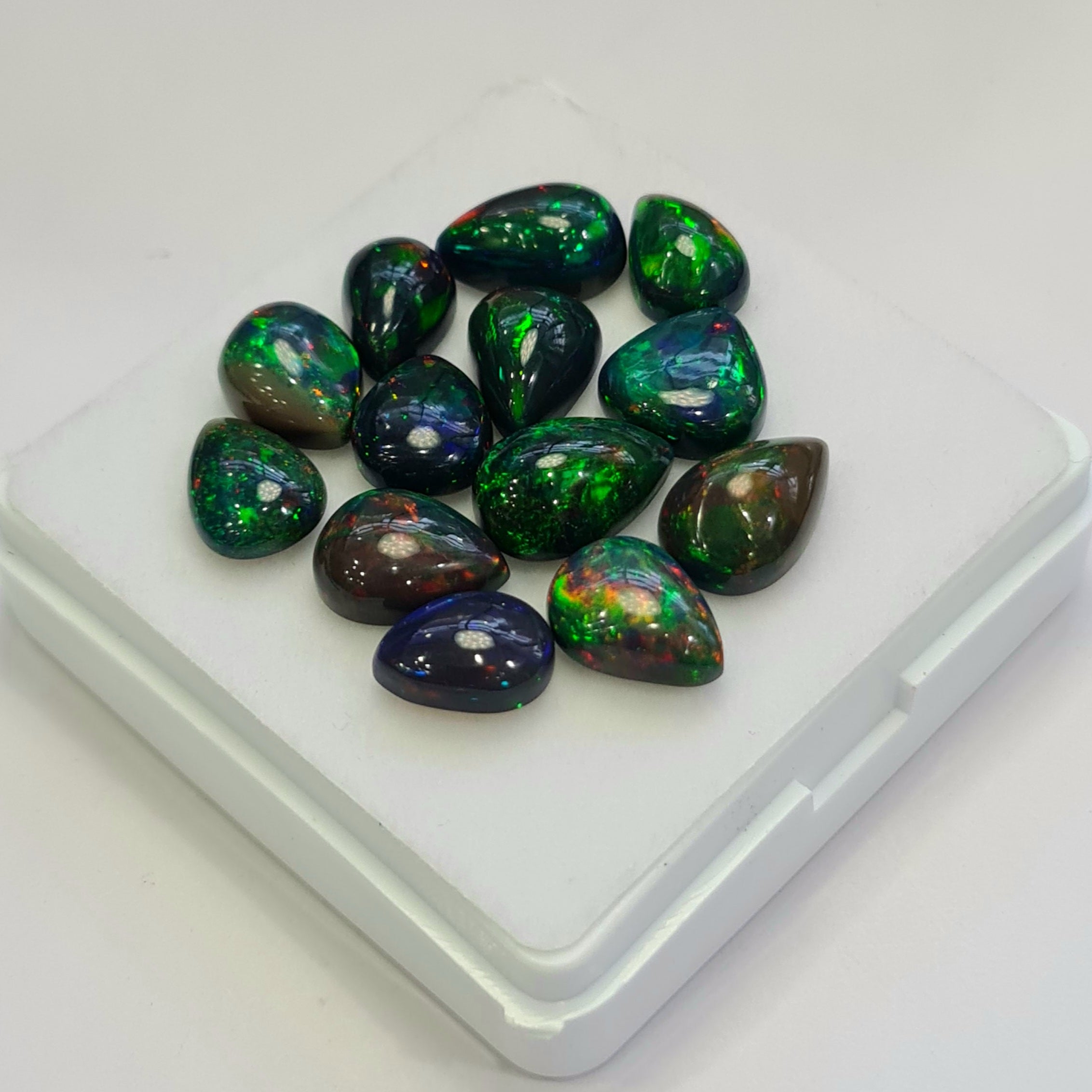 13 pcs of  Ethiopian Black Smoked Opal Pear Shape | 24.1Cts | 10mm to 12mm size