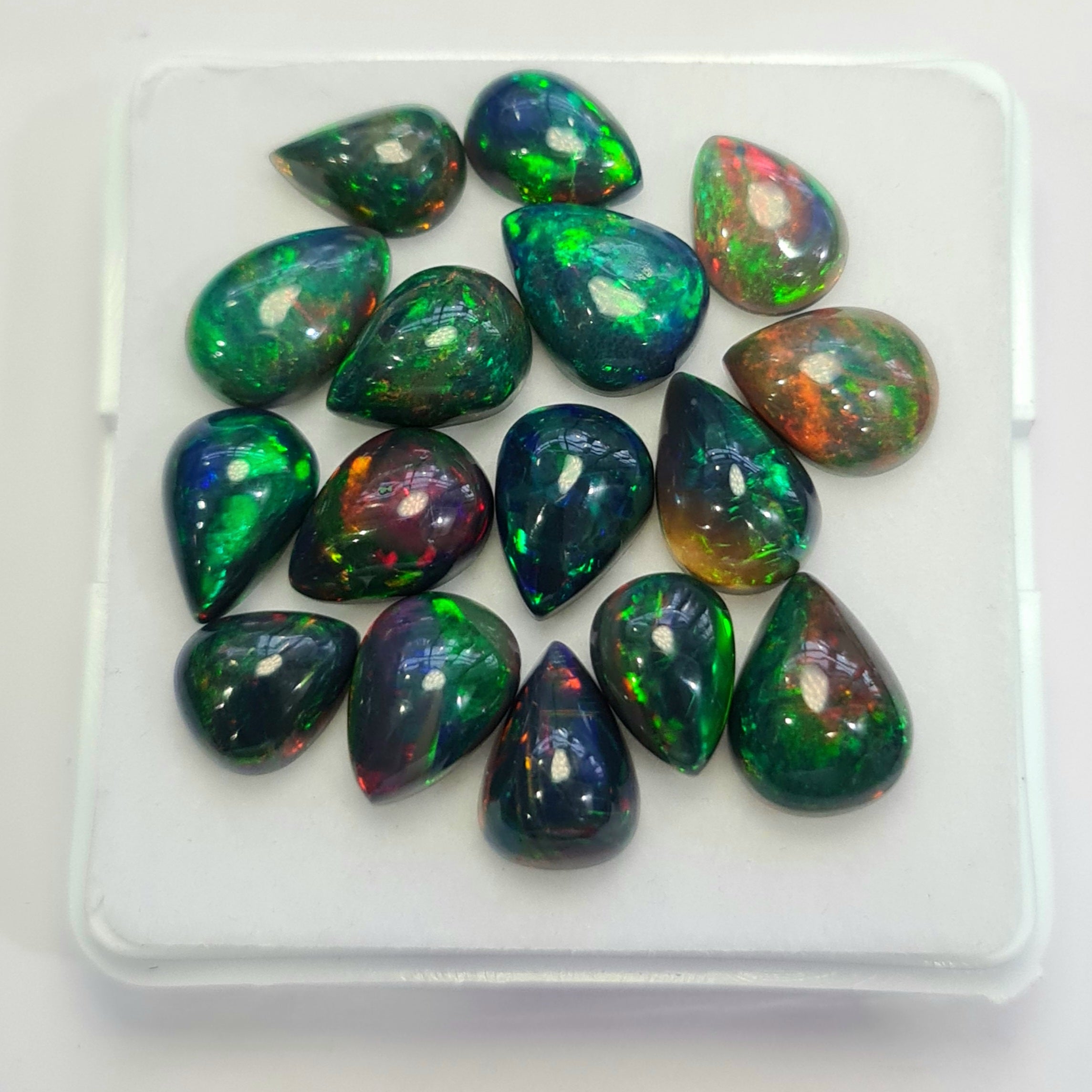 16 pcs of  Ethiopian Black Smoked Opal Pear Shape | 30.9Cts | 9mm to 12mm size