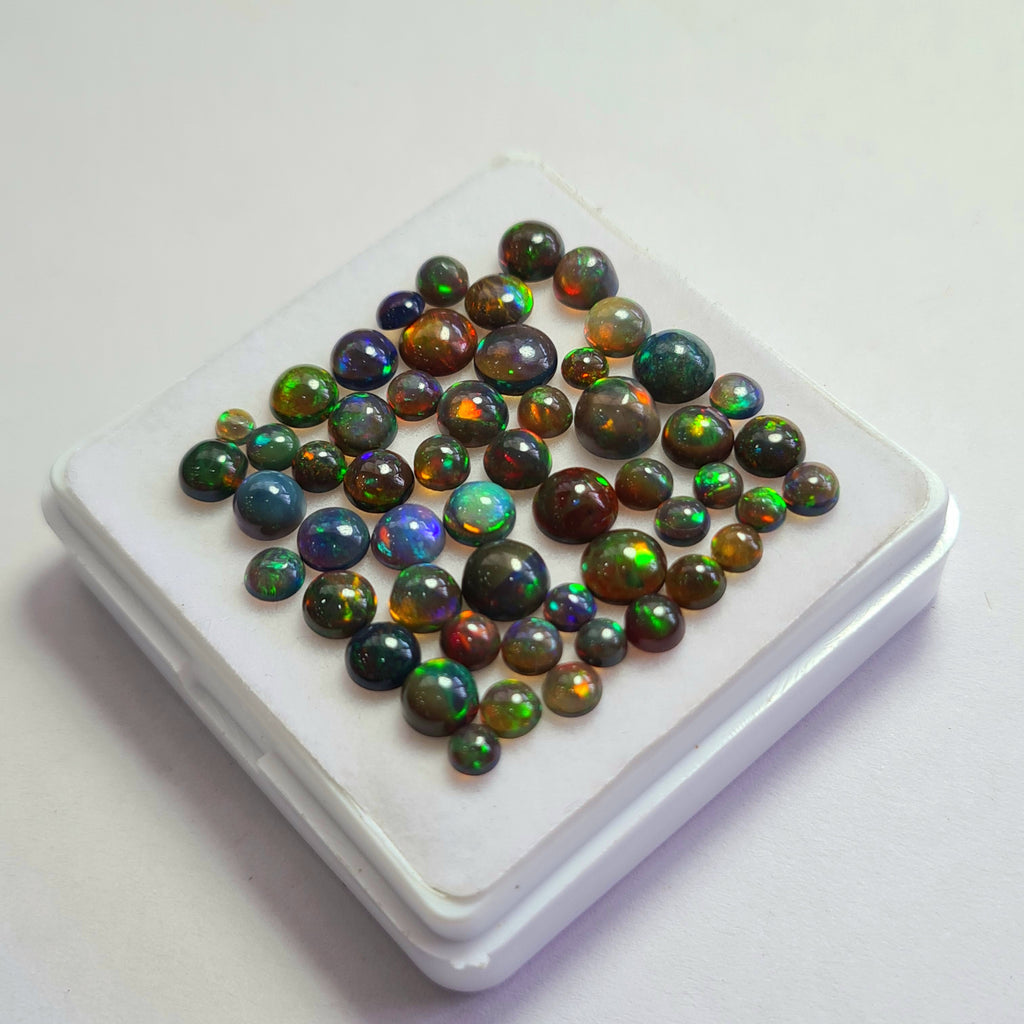 54 pcs of  Ethiopian Black Smoked Opal Round Shape | 15Cts | 3mm to 6mm size
