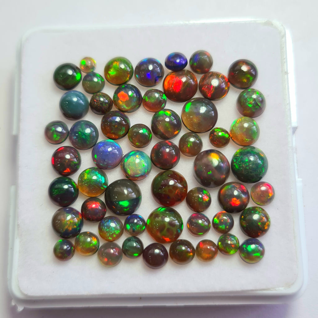 54 pcs of  Ethiopian Black Smoked Opal Round Shape | 15Cts | 3mm to 6mm size
