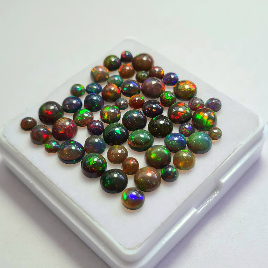 52 pcs of  Ethiopian Black Smoked Opal Round Shape | 18.1Cts | 3mm to 6mm size