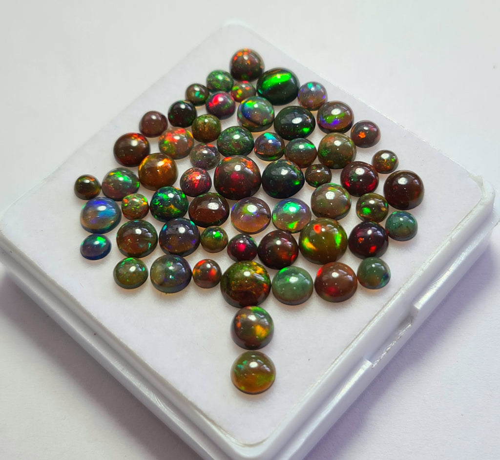 57 pcs of  Ethiopian Black Smoked Opal Round Shape | 15.7Cts | 3mm to 6mm size