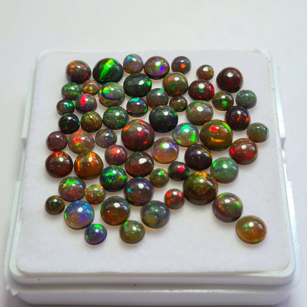57 pcs of  Ethiopian Black Smoked Opal Round Shape | 15.7Cts | 3mm to 6mm size