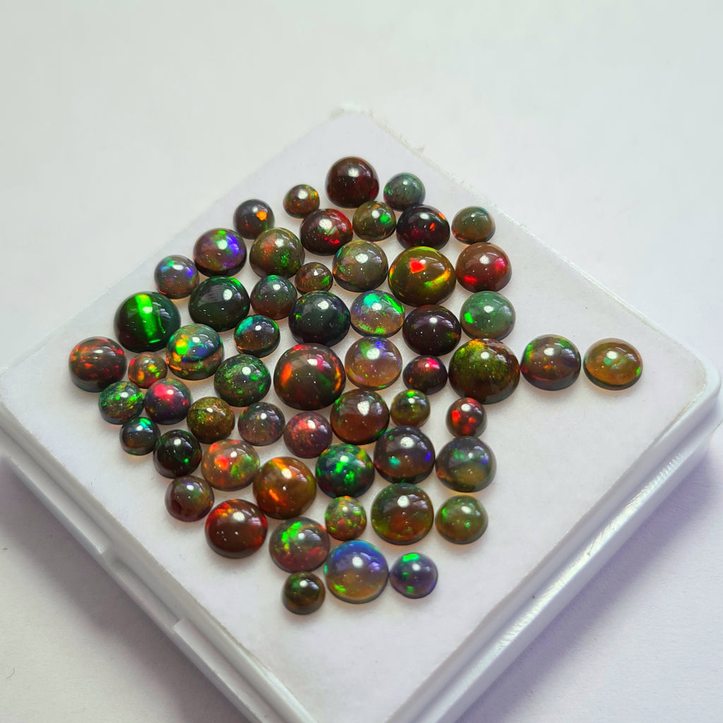 57 pcs of  Ethiopian Black Smoked Opal Round Shape | 15.7Cts | 3mm to 6mm size