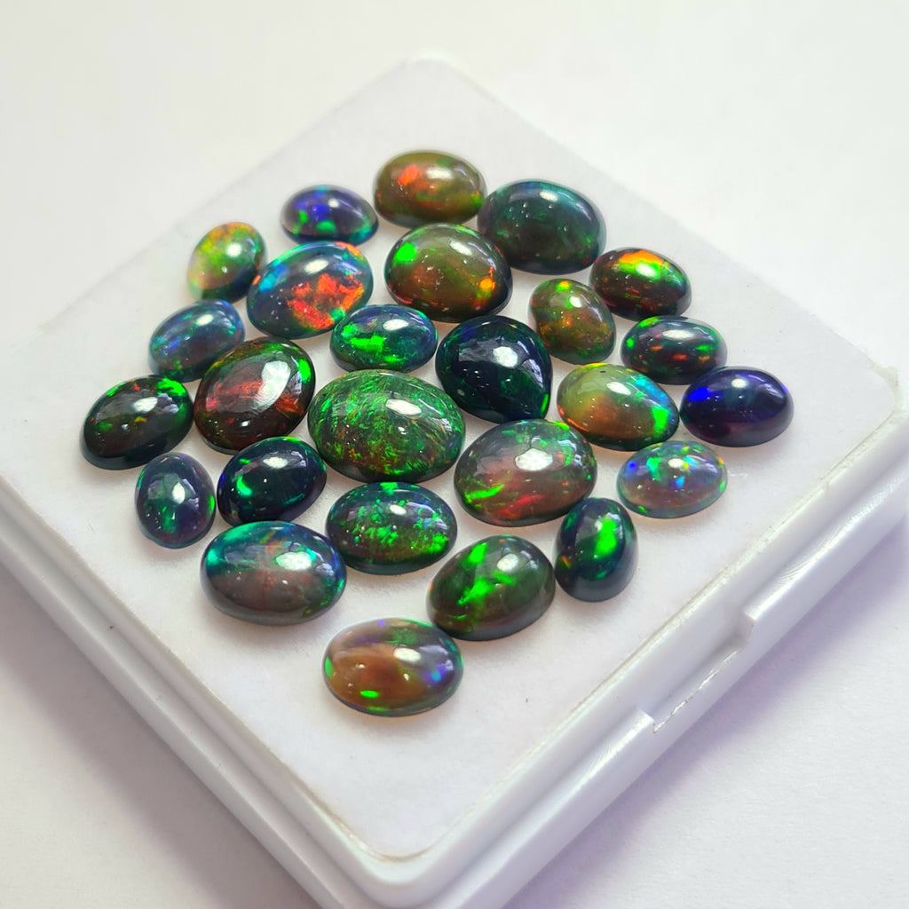 26 pcs of  Ethiopian Black Smoked Opal Mix Shape | 19.7Cts | 7mm to 10mm size