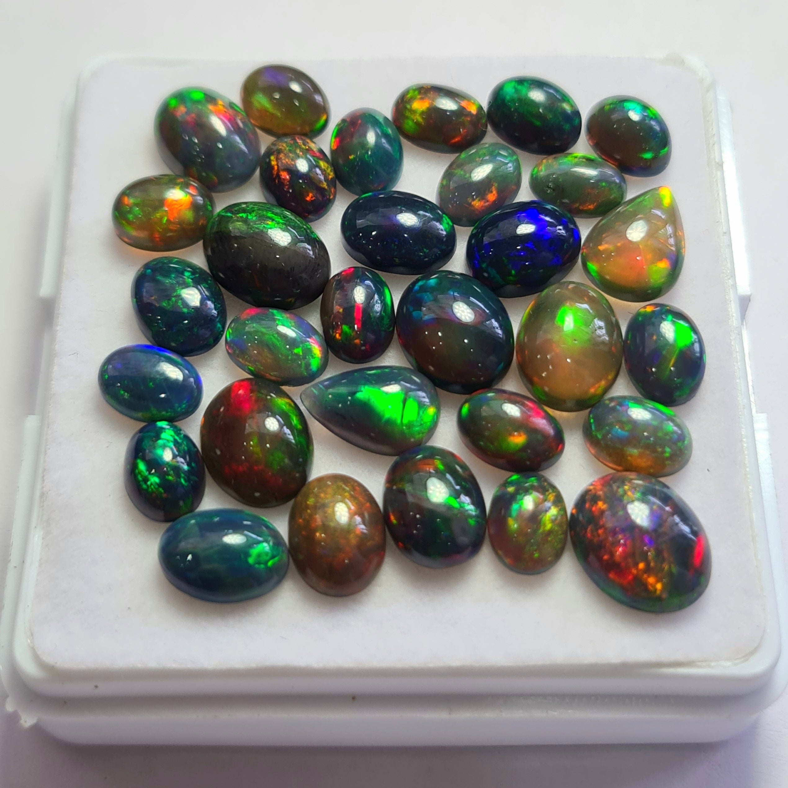 31 pcs of  Ethiopian Black Smoked Opal Mix Shape | 22.8Cts | 7mm to 10mm size
