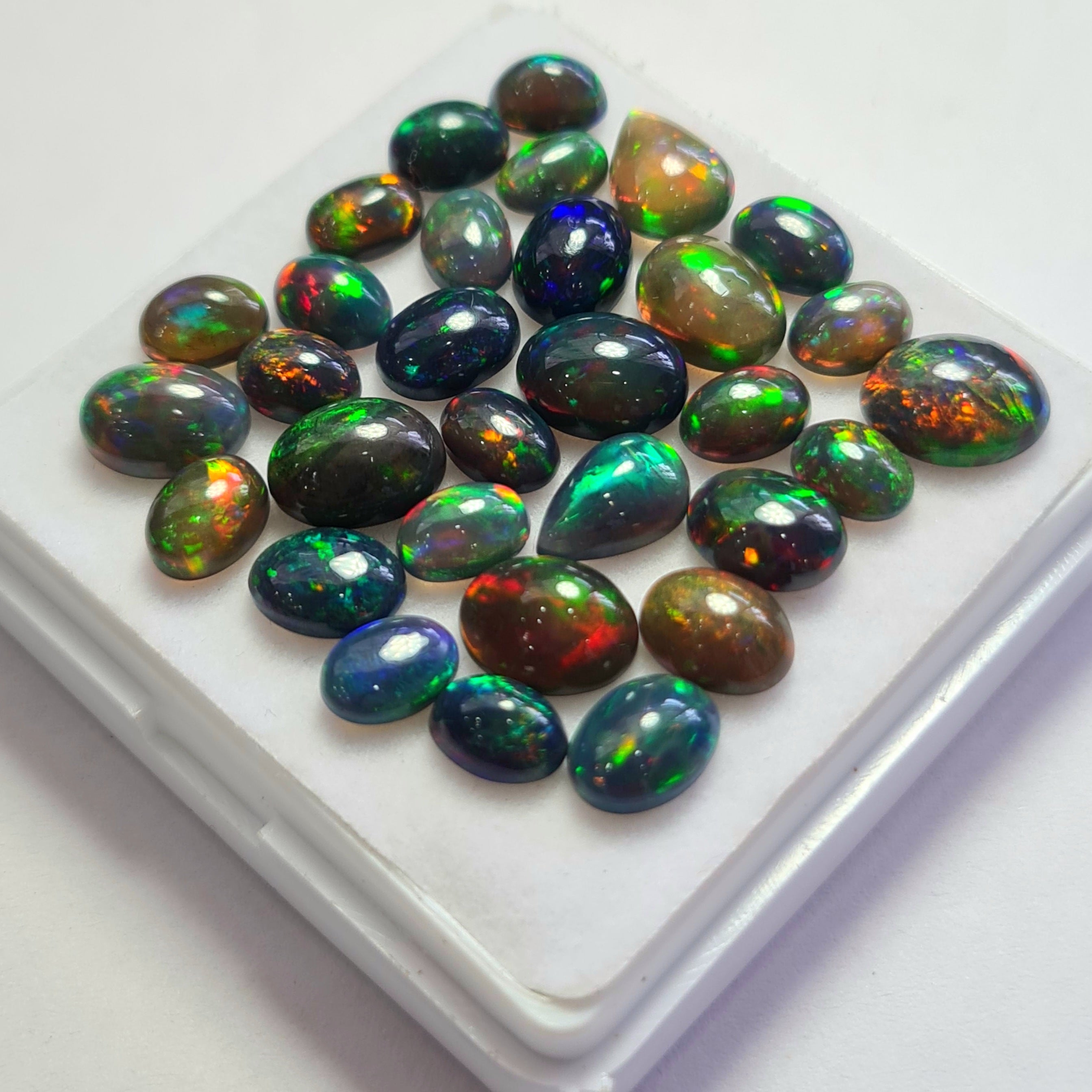 31 pcs of  Ethiopian Black Smoked Opal Mix Shape | 22.8Cts | 7mm to 10mm size