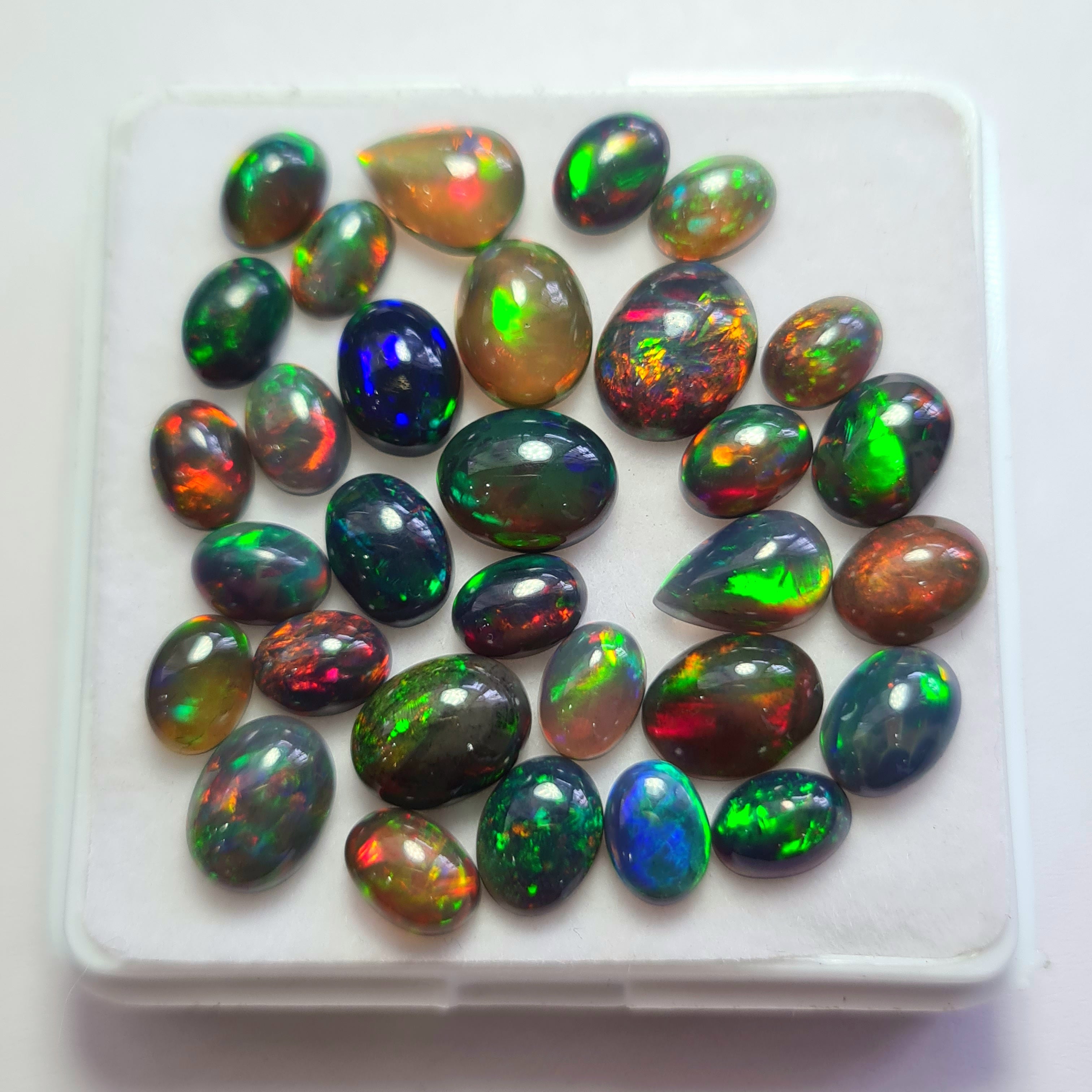 31 pcs of  Ethiopian Black Smoked Opal Mix Shape | 22.8Cts | 7mm to 10mm size