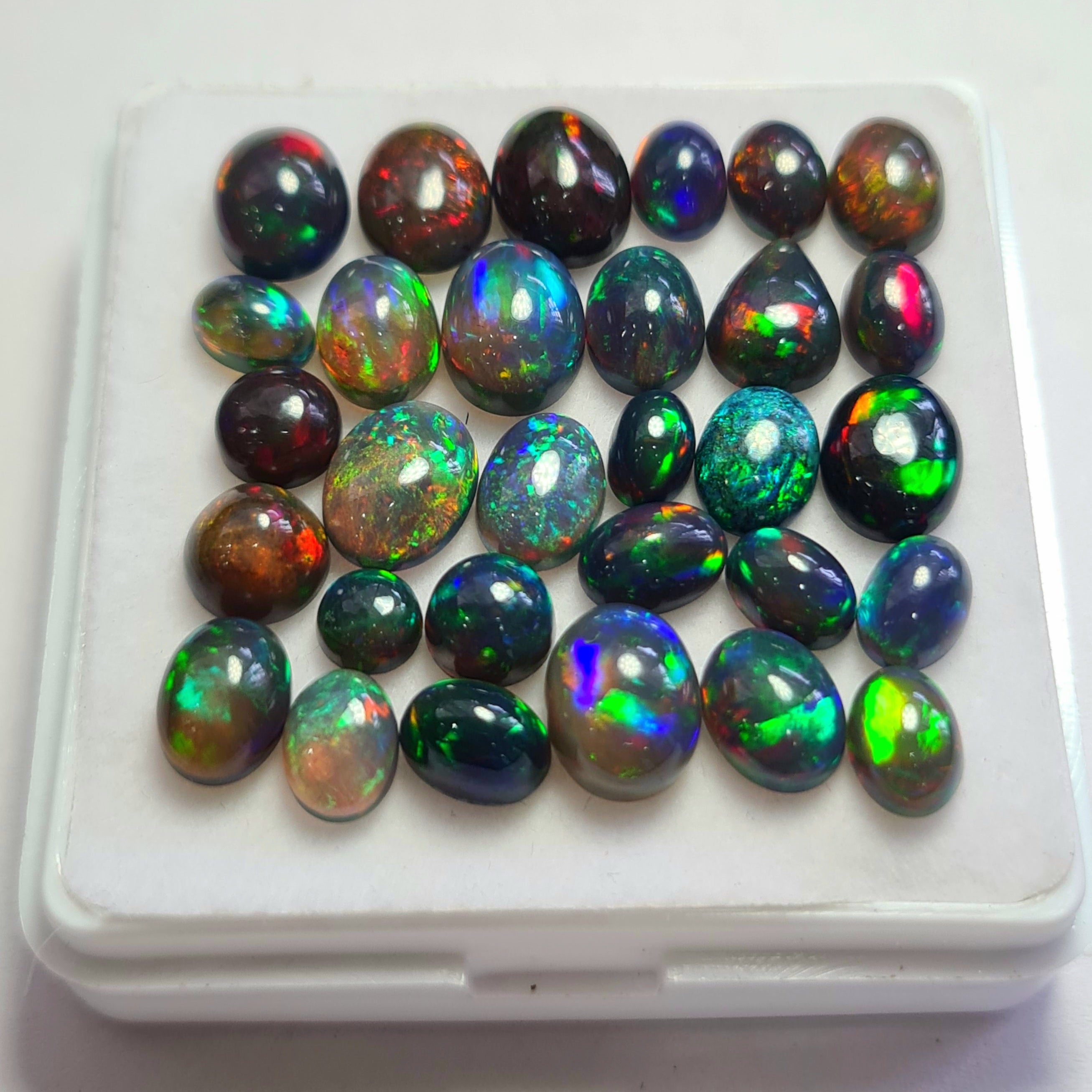 30 pcs of  Ethiopian Black Smoked Opal Mix Shape | 23.8Cts | 5mm to 9mm size