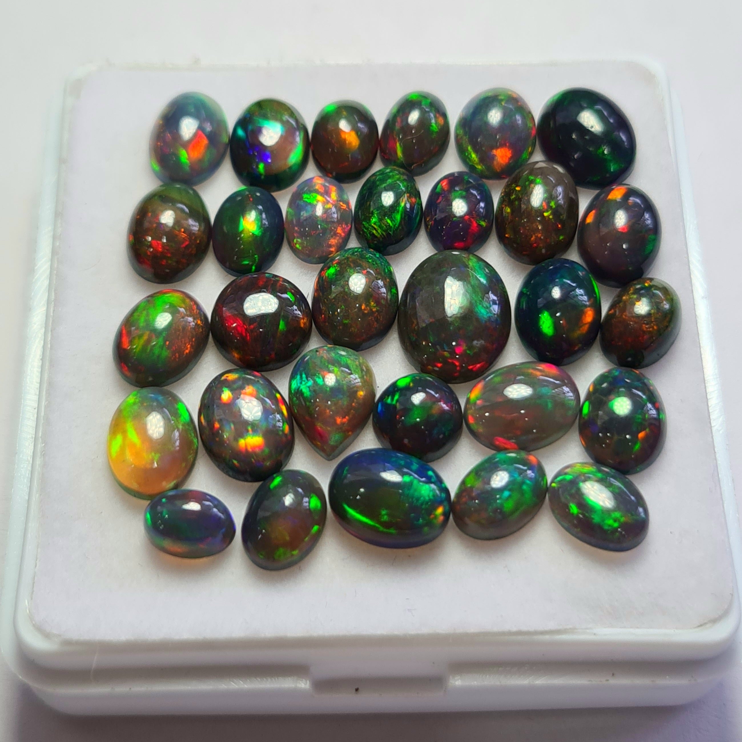 30 pcs of  Ethiopian Black Smoked Opal Mix Shape | 21.5Cts | 6mm to 10mm size