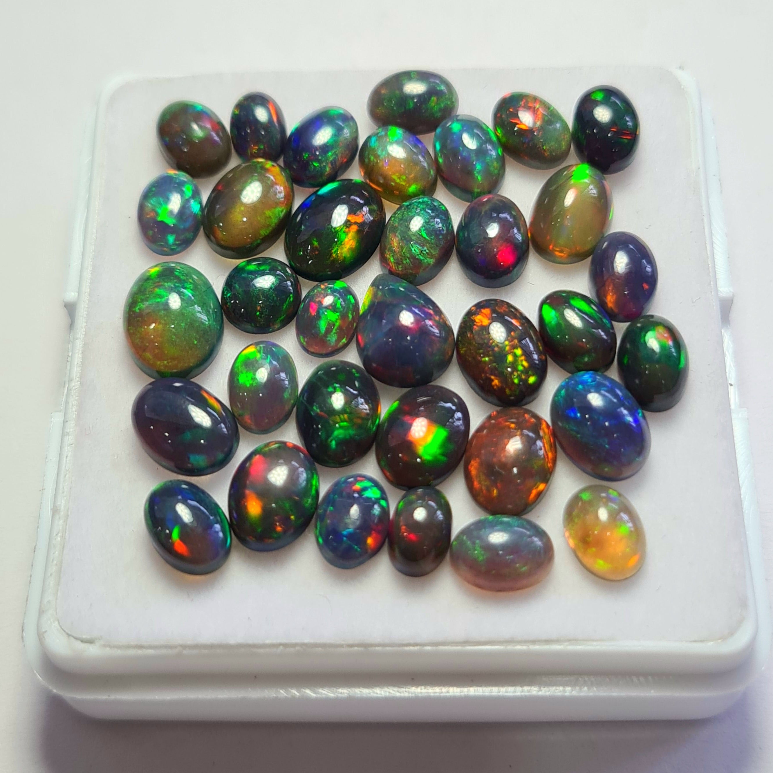 34 pcs of  Ethiopian Black Smoked Opal Mix Shape | 21.1Cts | 6mm to 9mm size
