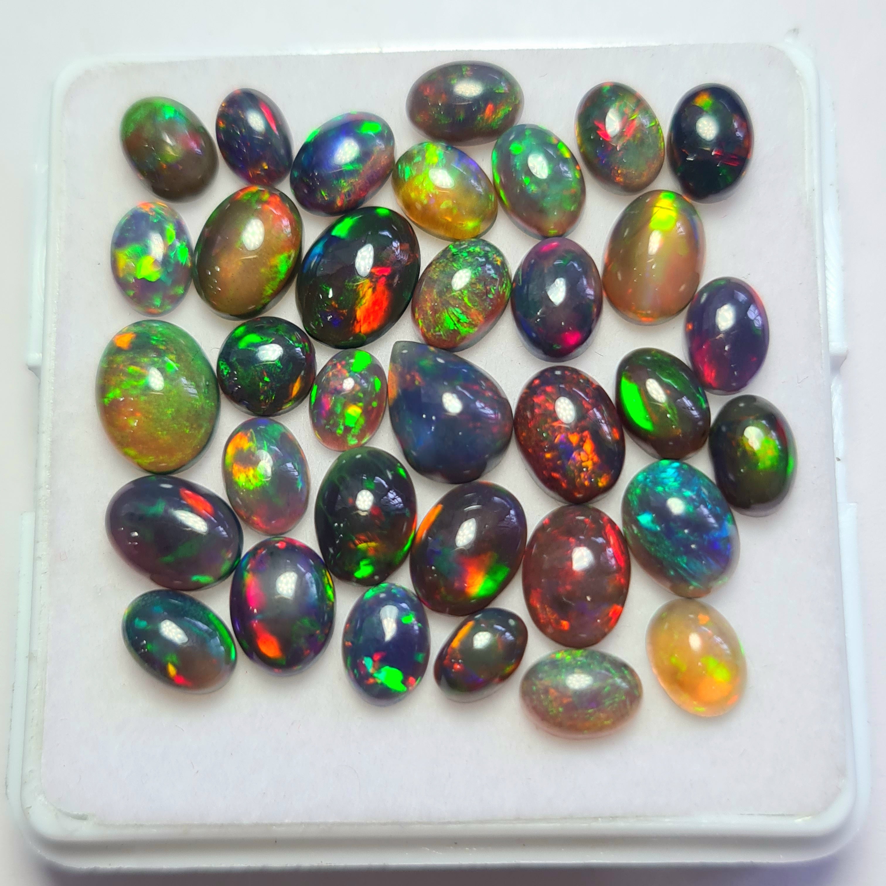 34 pcs of  Ethiopian Black Smoked Opal Mix Shape | 21.1Cts | 6mm to 9mm size
