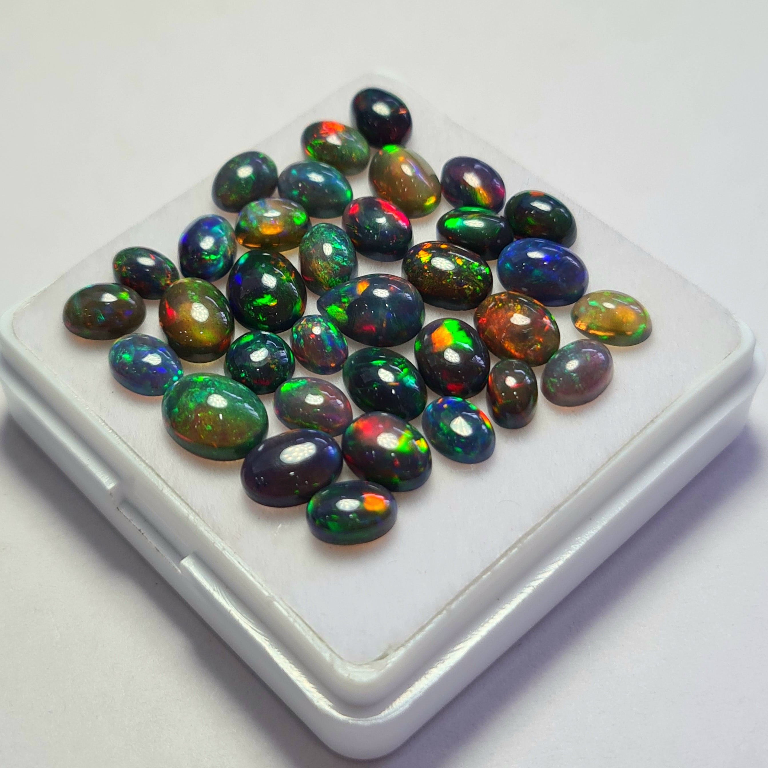 34 pcs of  Ethiopian Black Smoked Opal Mix Shape | 21.1Cts | 6mm to 9mm size