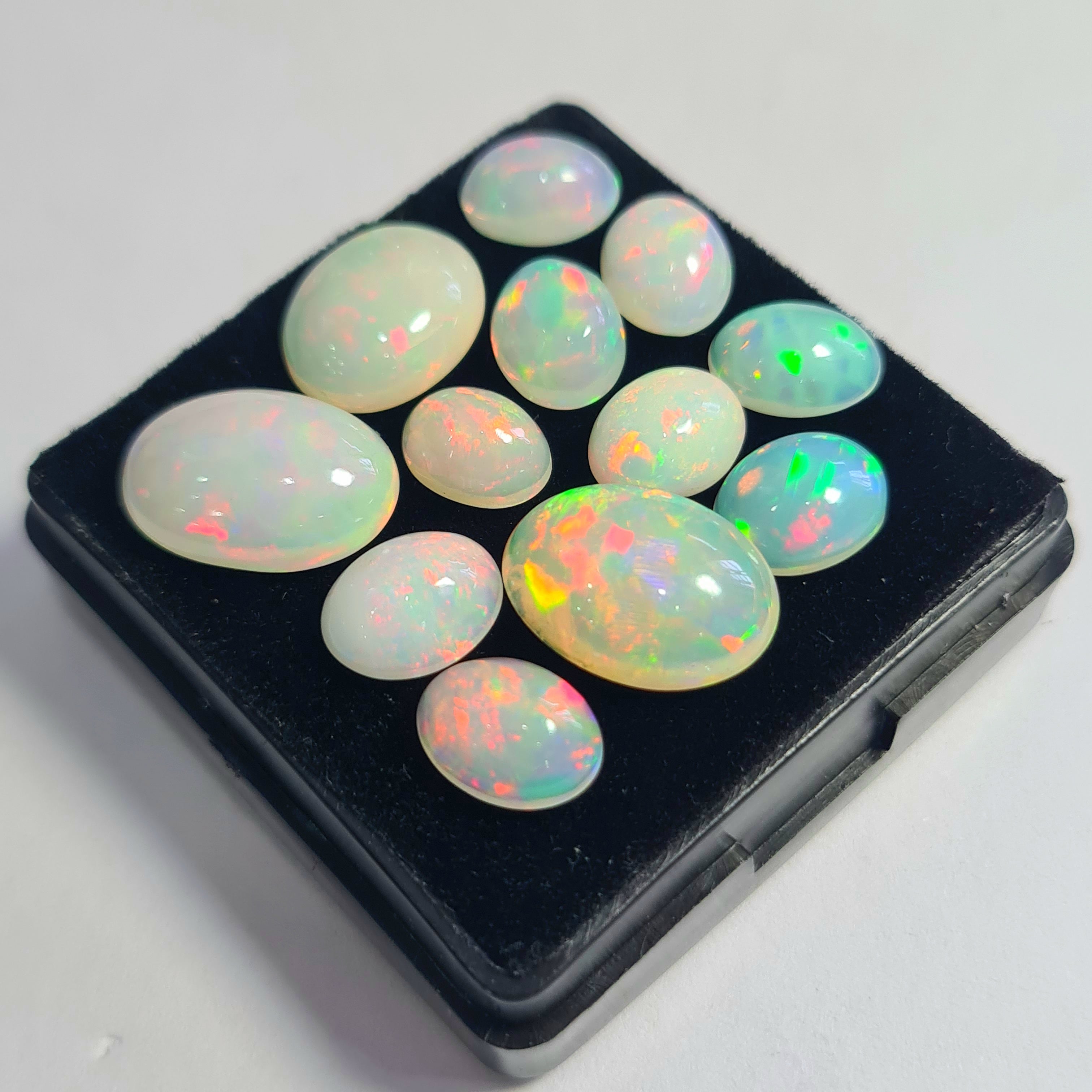 12 pcs of Natural Opal Oval Shape | 17.7Cts | 8mm to 14mm size