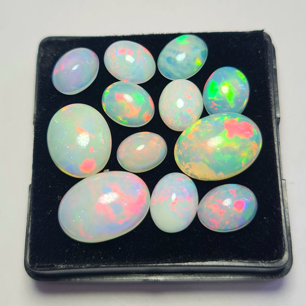 12 pcs of Natural Opal Oval Shape | 17.7Cts | 8mm to 14mm size