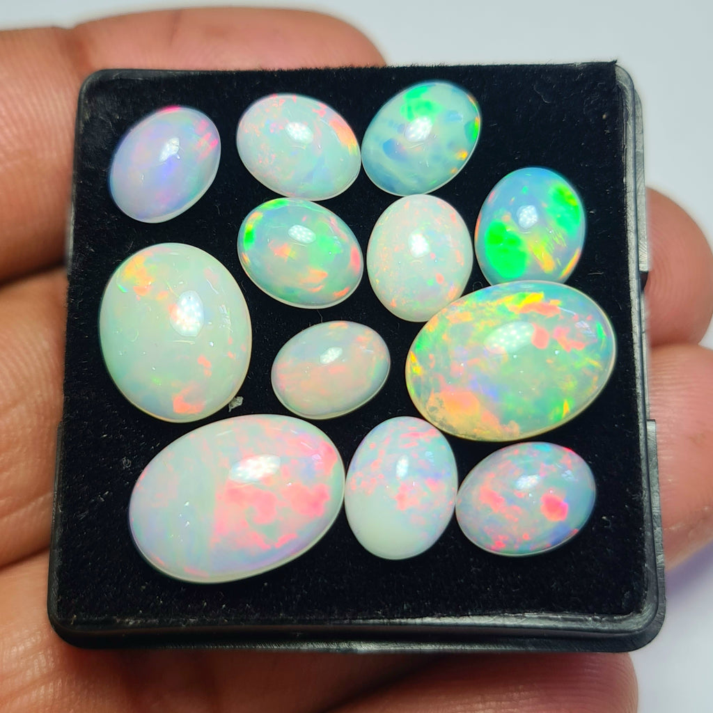 12 pcs of Natural Opal Oval Shape | 17.7Cts | 8mm to 14mm size
