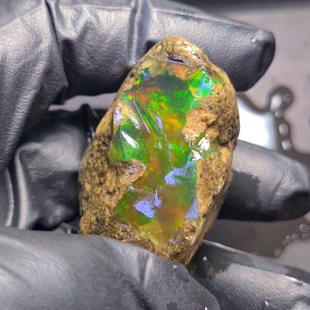 248Carats | Ethiopian  Water Opal Specimen grade | Brilliant play of colour| 47x40mm