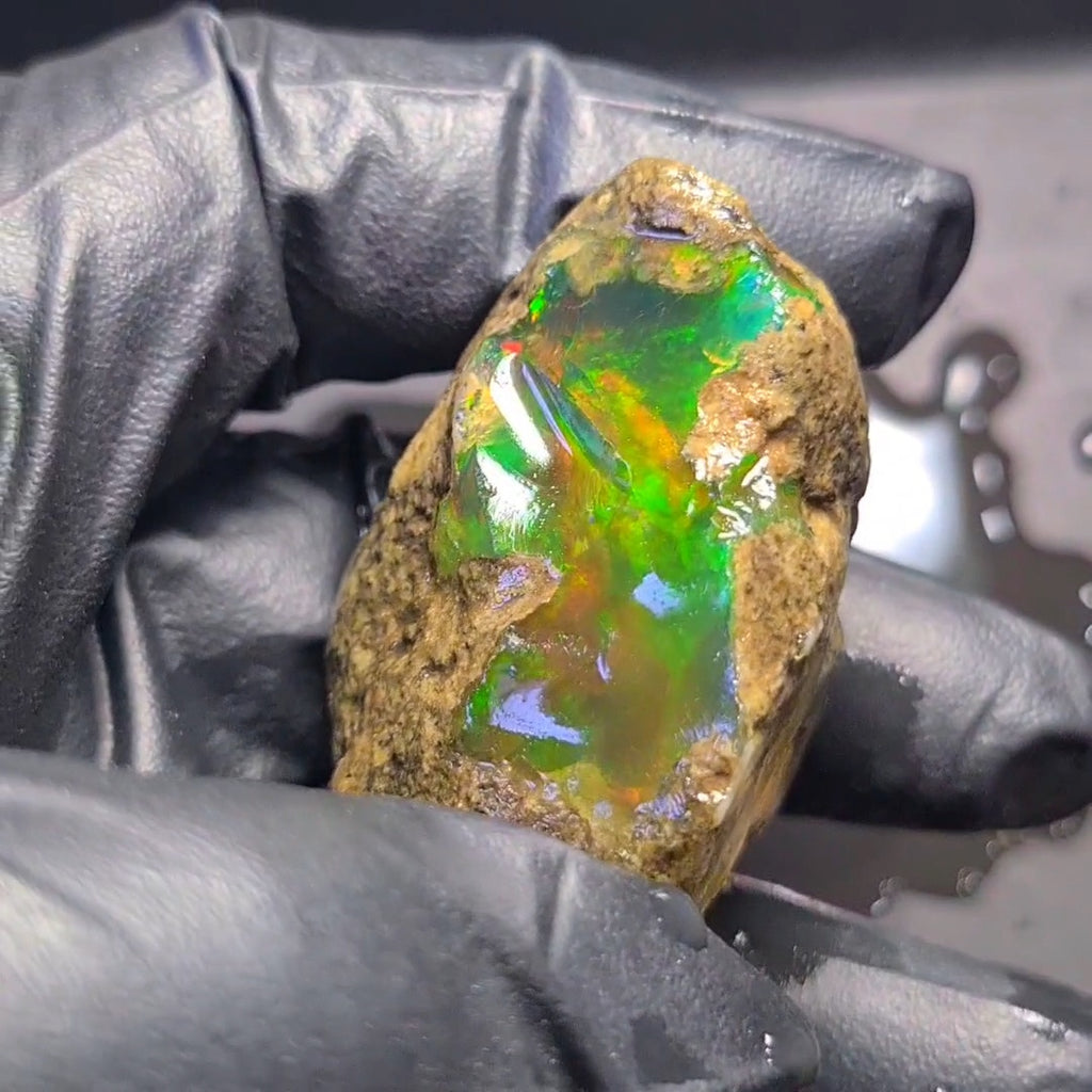 248Carats | Ethiopian  Water Opal Specimen grade | Brilliant play of colour| 47x40mm