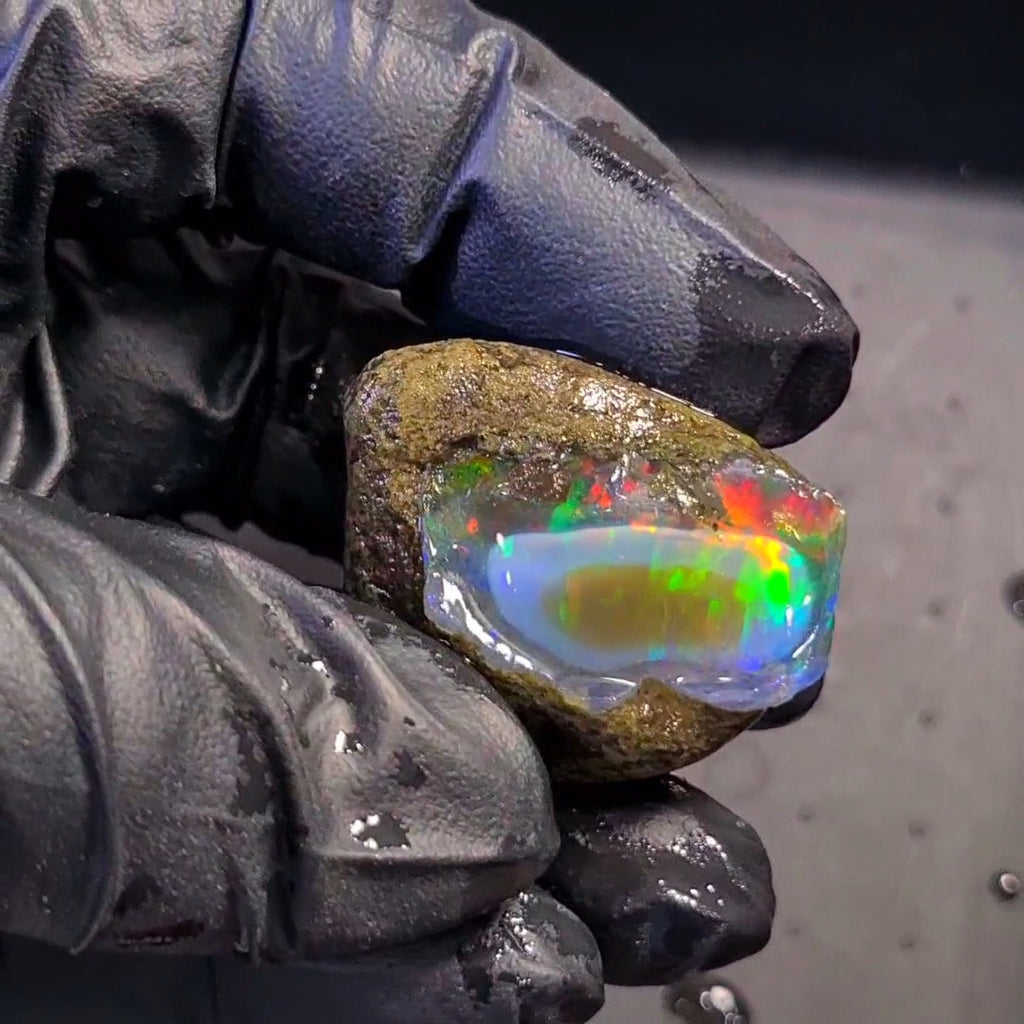 122Carats | Ethiopian Phantom Water Opal Specimen grade | Brilliant play of colour| 36x30mm