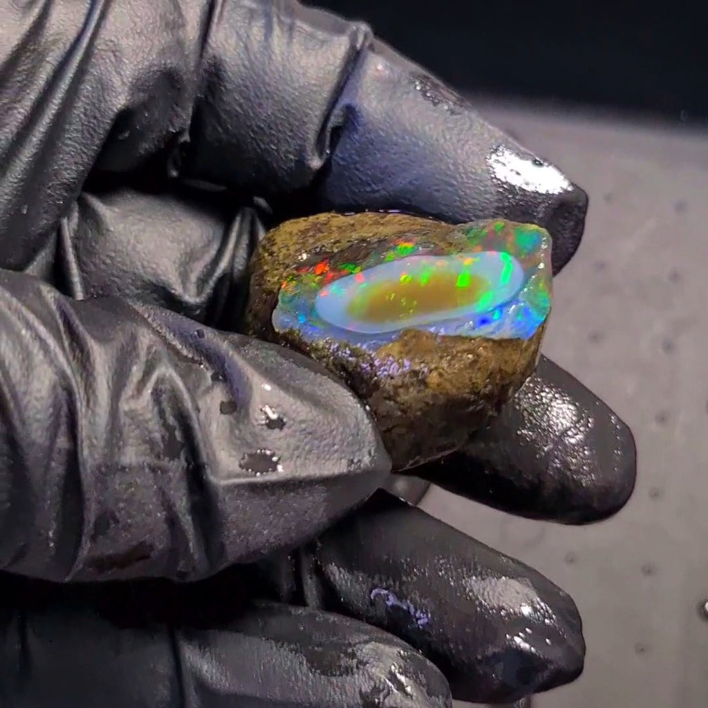 122Carats | Ethiopian Phantom Water Opal Specimen grade | Brilliant play of colour| 36x30mm