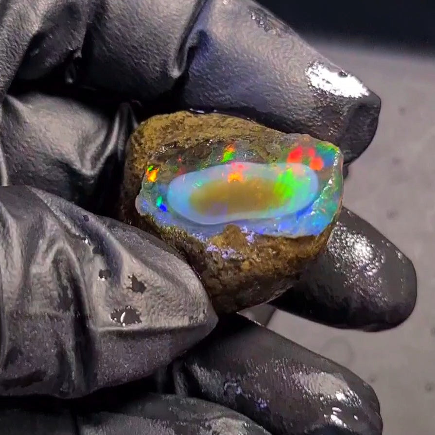 122Carats | Ethiopian Phantom Water Opal Specimen grade | Brilliant play of colour| 36x30mm