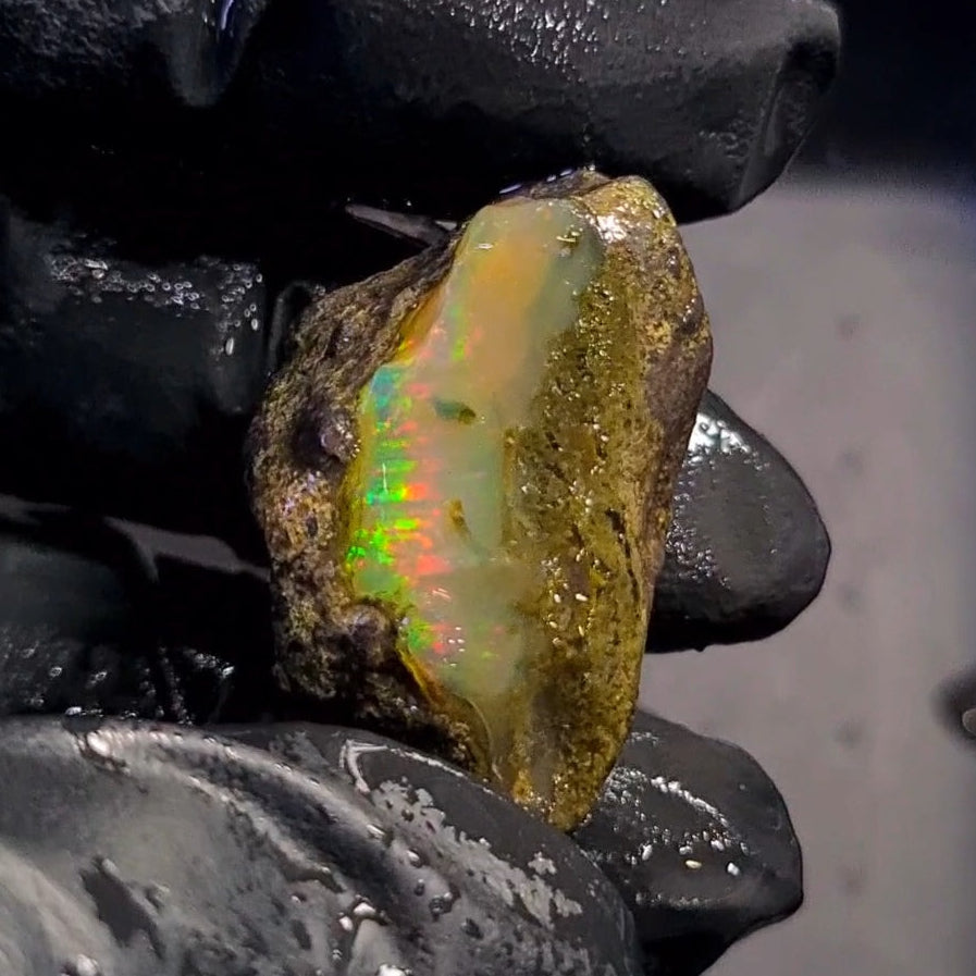 58Carats | Ethiopian Water Opal Specimen grade | Brilliant play of colour| 32x22mm