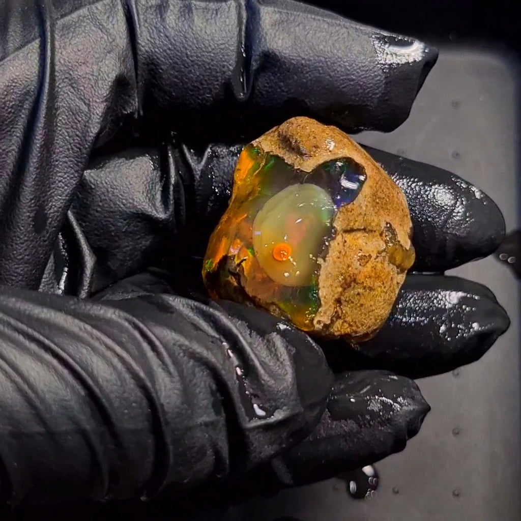 115Carats | Ethiopian Phantom Water Opal Specimen grade | Brilliant play of colour| 35x29mm