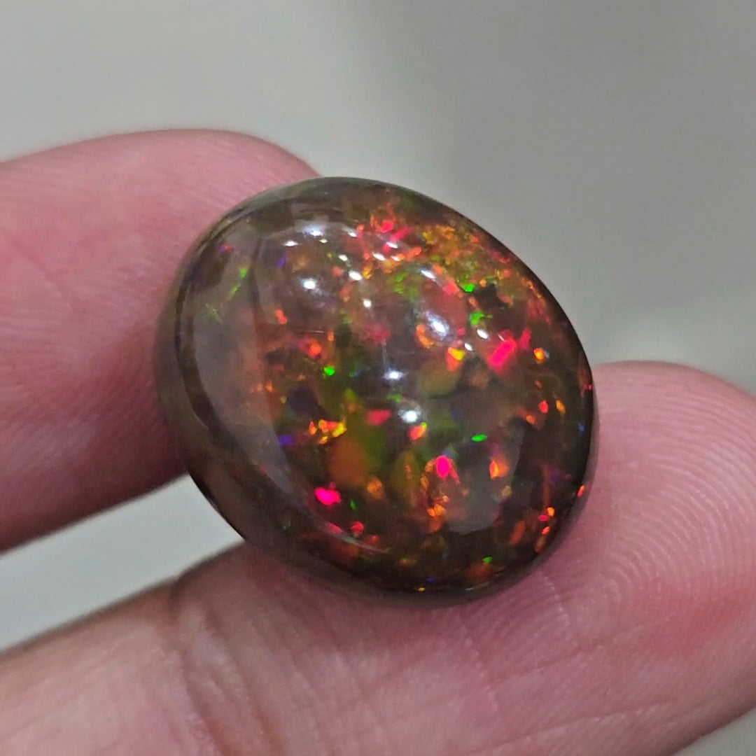 15.7Cts Natural Ethiopian Black Opal Cabochon | Oval | 20x16mm | Smoked