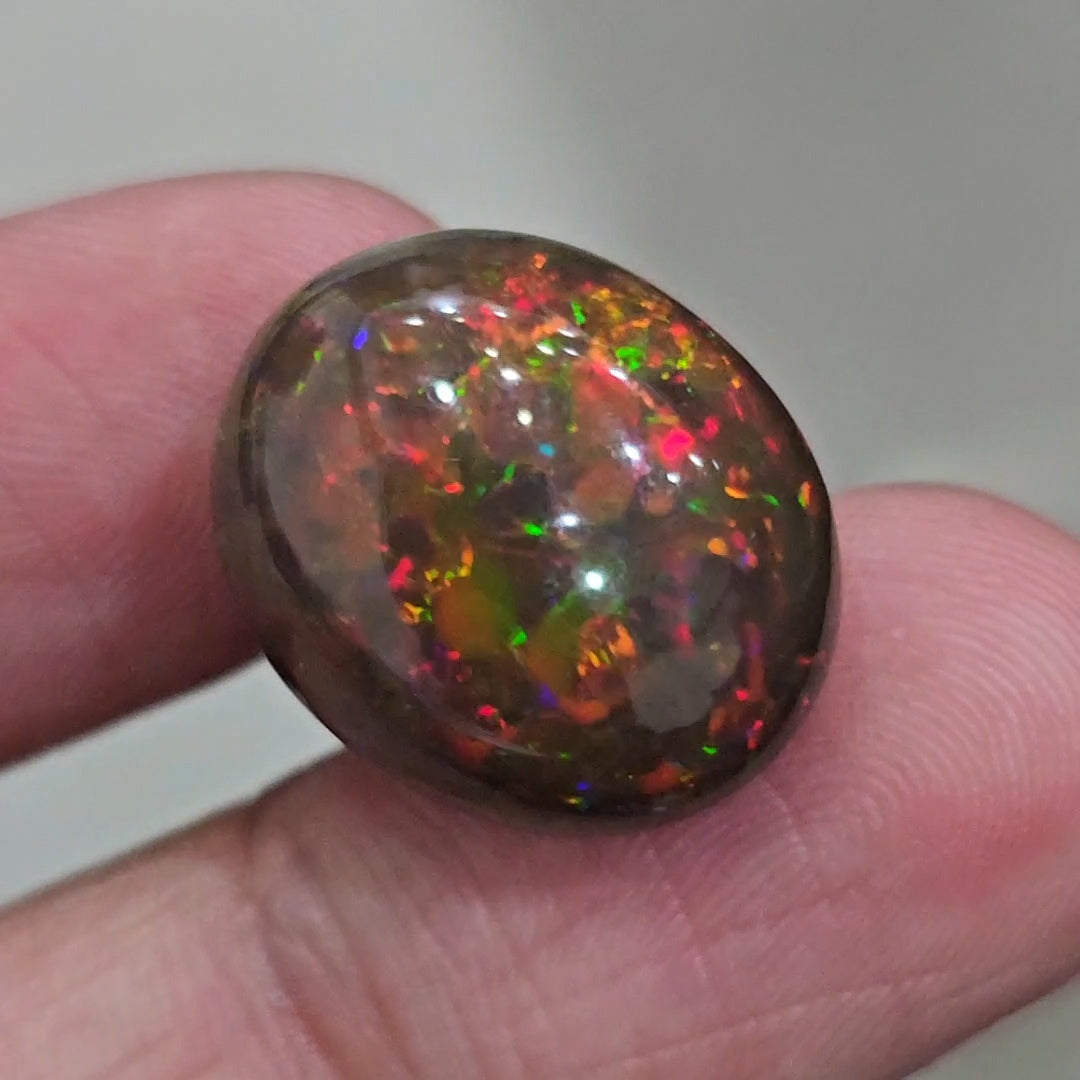 15.7Cts Natural Ethiopian Black Opal Cabochon | Oval | 20x16mm | Smoked