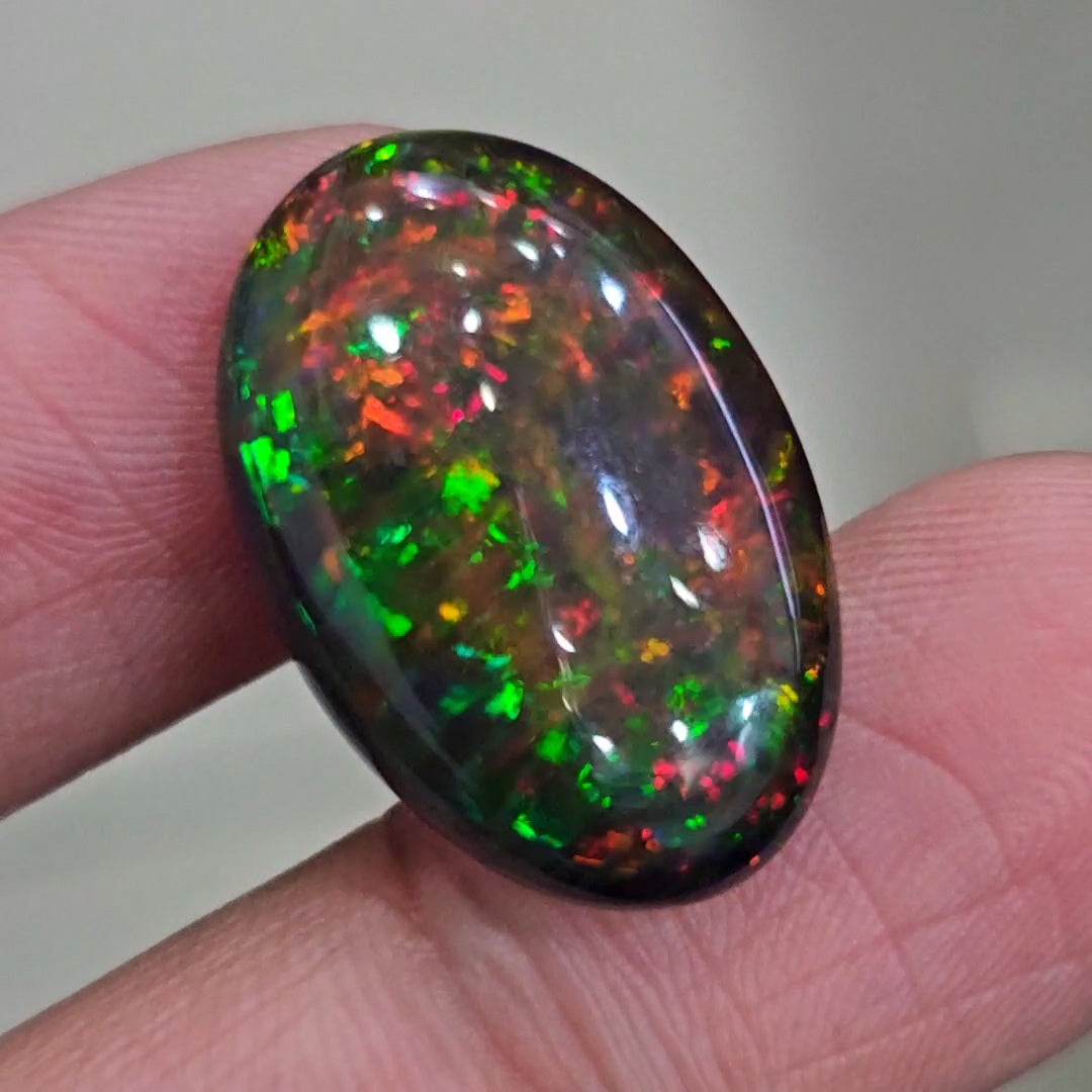 12.4Cts Natural Ethiopian Black Opal Cabochon | Oval | 25x17mm | Smoked
