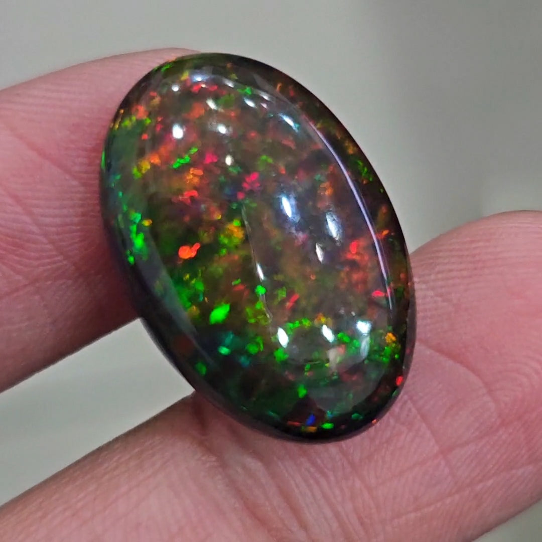 12.4Cts Natural Ethiopian Black Opal Cabochon | Oval | 25x17mm | Smoked