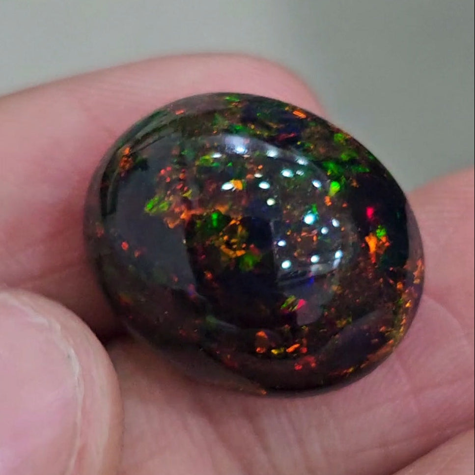 17.4Cts Natural Ethiopian Black Opal Cabochon | Oval | 20x17mm | Smoked