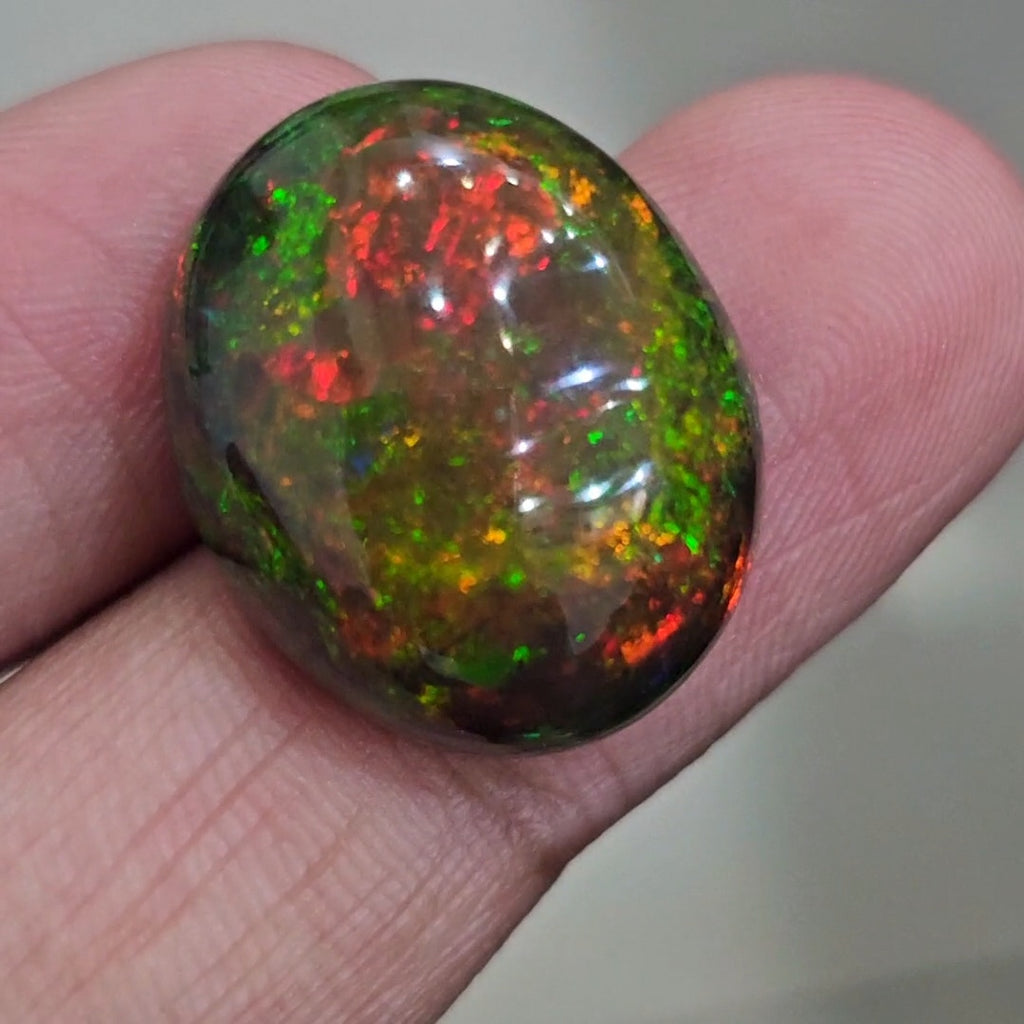 17.6Cts Natural Ethiopian Black Opal Cabochon | Oval | 22x18mm | Smoked