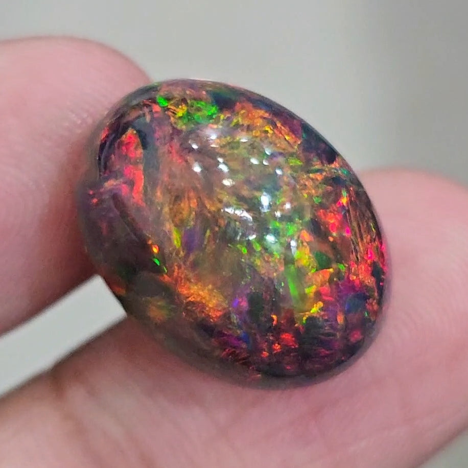 16.3Cts Natural Ethiopian Black Opal Cabochon | Oval | 19x15mm | Smoked