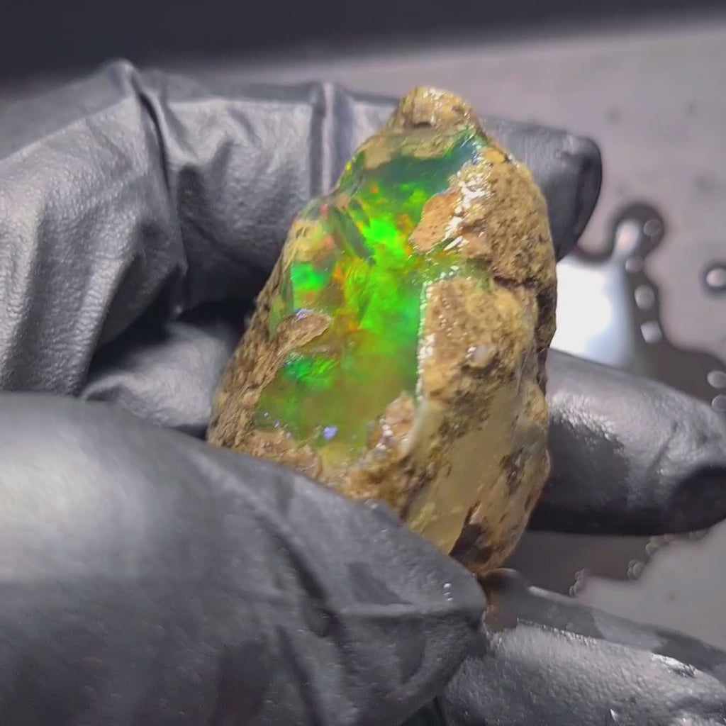 248Carats | Ethiopian  Water Opal Specimen grade | Brilliant play of colour| 47x40mm