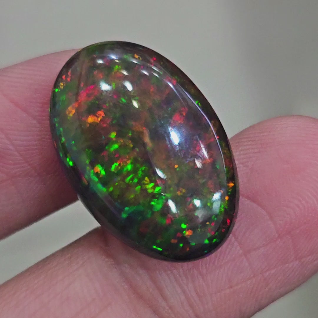 12.4Cts Natural Ethiopian Black Opal Cabochon | Oval | 25x17mm | Smoked